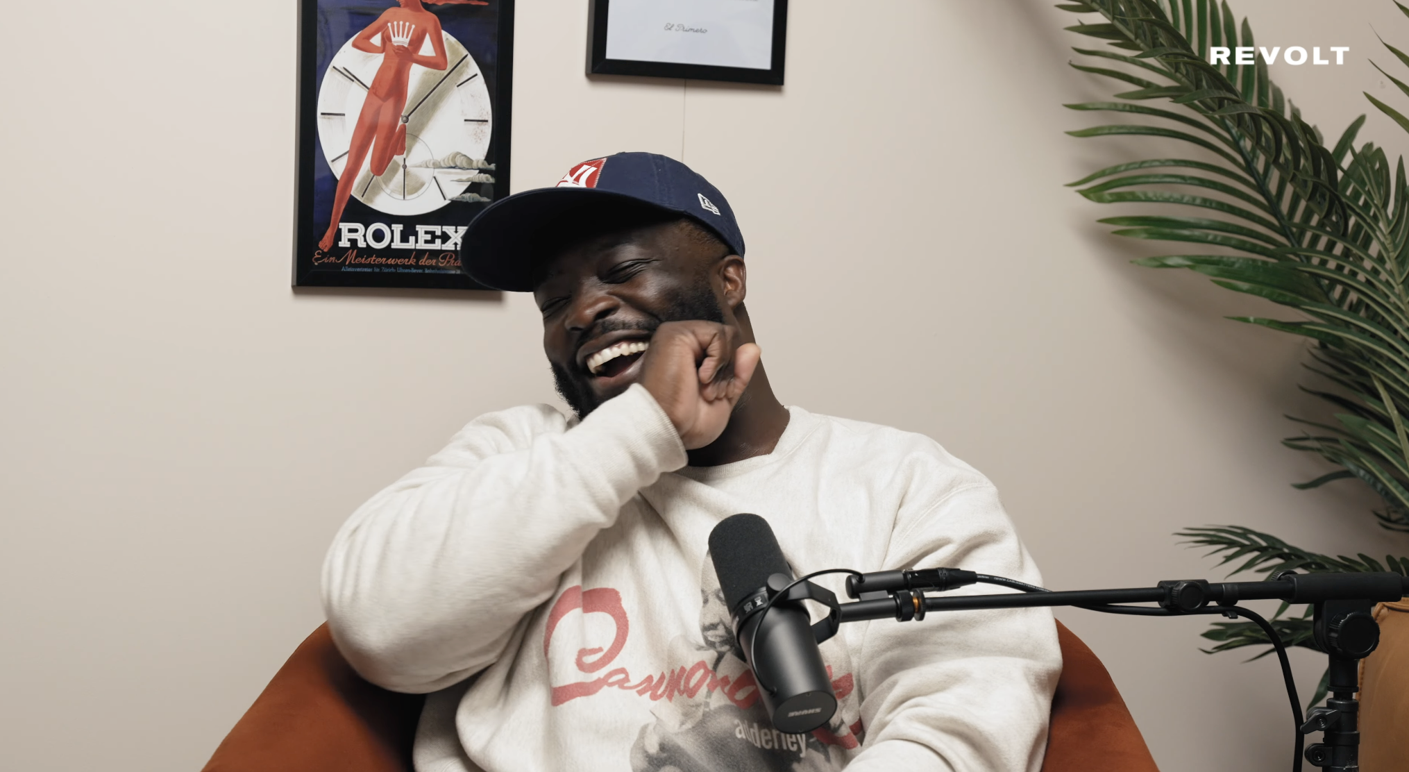 Rashawn Smith of The Wrist Check Podcast smiling during interview with Mach-Hommy.