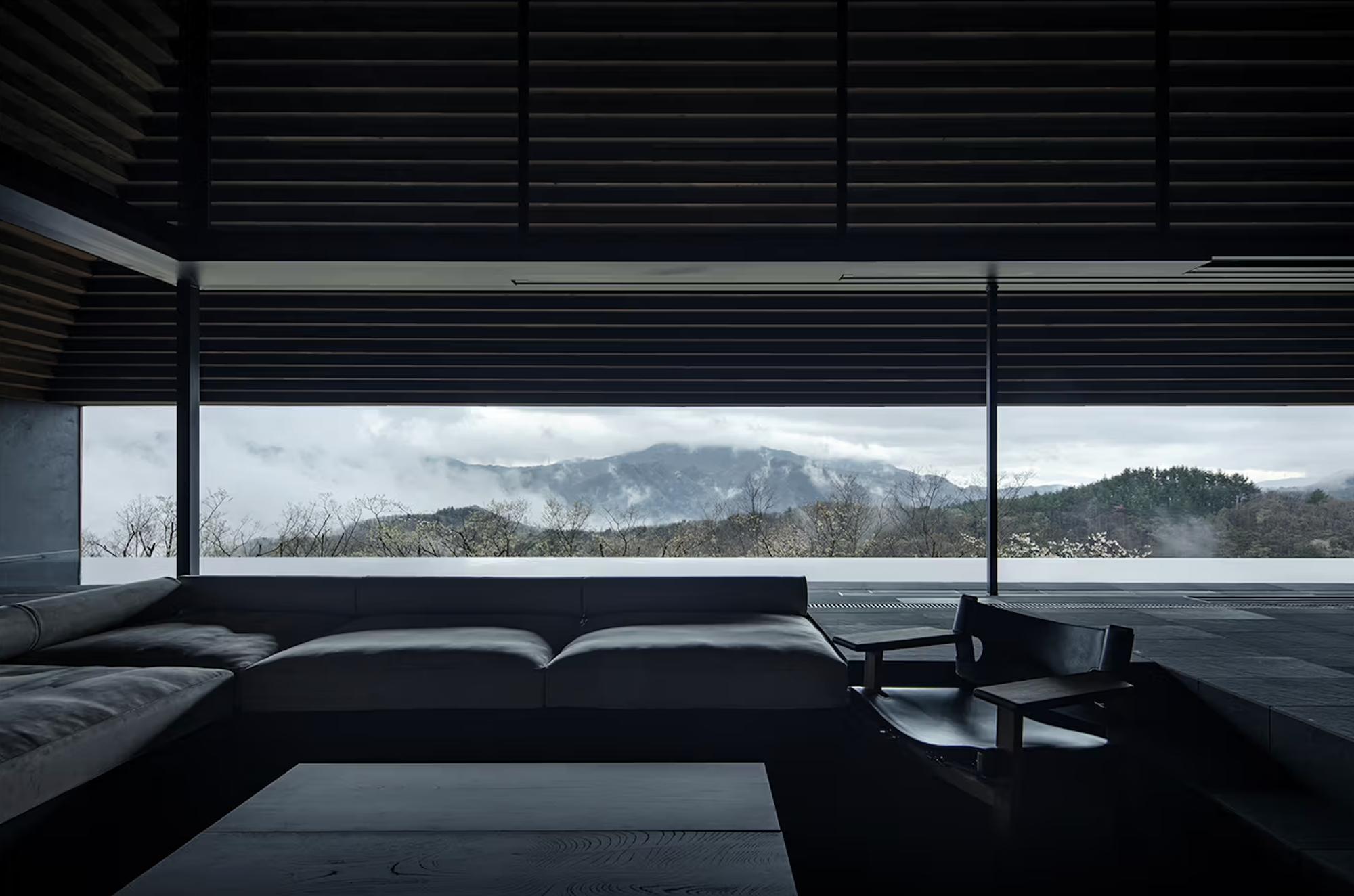 Architect-designed residence emphasizing restraint, landscape, and open horizon